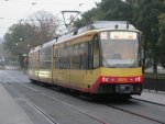 Tw 869 am 16.10.2010 im stmenden Regen in Karlsruhe als S4 zum Hauptbahnhof als EILZUG.