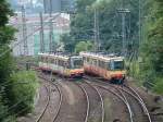 2 stadtbahnwagen der karlsruher verkehrsbetriebe auf den gleisen der db kurz vor hbf pforzheim am 09.08.02