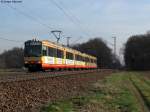 24.03.2011: Wagen 823 mit Werbung von Schuh Gtz und Wagen 820 mit Werbung von Experimenta Heilbronn unterwegs als S31 nach Karlsruhe Hbf. Aufgenommen zwischen Weingarten und Karlsruhe-Durlach.