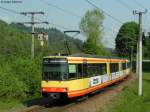 01.05.2011: Wagen 587 mit einem weiteren Triebwagen als S1 nach Bad Herrenalb beim Bahnbergang Herrenalber Strae in Frauenalb-Schielberg.