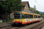 10.05.2011: Wagen 802 mit Werbung von Ensinger Mineralwasser und Ensinger Sport verlsst als S5 nach Wrth (Rhein) den Bahnhof Grtzingen.