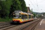 10.05.2011: Wagen 845 verlsst als S5 nach Knielingen-Rheinbergstrae den Bahnhof Grtzingen. Er wirbt fr die BG Karlsruhe. Bei diesem Wagen handelt es sich um einen etwas anderen S-Bahntriebwagen. Denn frher war er noch ein Regio Bistro. Heute ist er ein normaler S-Bahnwagen. Die Panoramaglser wurden mit dem Umbau in das Dach eingebaut, so dass ein Blick durch diese Fenster nicht mehr mglich ist. Hier der Link zu einem Bild von Herbert Graf aus dem Jahr 2006, als Wagen 845 noch als Regio Bistro unterwegs war: http://www.bahnbilder.de/name/einzelbild/number/72522/kategorie/deutschland~s-bahnen-und-regionalstadtbahnen~stadtbahn-karlsruhe-hier-nur-die-s-bahnen.html.