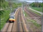 Am 04.05.2006 war diese Zweisystem-Stadtbahn mit dem Triebwagen 857 an der Spitze auf der Linie S4 zwischen den Karlsruher Stadtteilen Grtzingen und Durlach in Richtung Karlsruhe Hbf unterwegs.