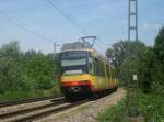 Tw 856 gezogen von Tw 820 am 24.05.2011 als S32 von Rastatt Bf nach Karlsruhe Hbf. Das Gefhrt befindet sich zwischen den Haltepunkten Bruchhausen (b Ettlingen) und Ettlingen West. Der nchste Halt Ettlingen West wird in etwa 1-2 Minuten erreicht. Nach Ettlingen West kommt dann der Endhalt Karlsruhe Hbf.