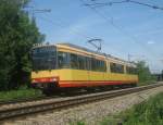 Tw 809 fuhr am 24.05.2011 solo als S32 von Bruchsal-Menzingen oder Karlsruhe Hbf nach Rastatt Bf. Er befindet sich zur Zeit auf der Kurve zwischen Ettlingen West und Bruchhausen (b Ettlingen) in Hhe Ettlingenweier.