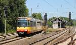 Als S6 nach Karlsruhe-Knielingen verlsst Wagen 830 der AVG am 1.8.2012 den Bahnhof von Sachsenheim.