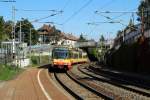 TW 819 und TW 8** als S9 nach Bruchsal beim Halt an der vorletzten Station Bruchsal-Tunnelstr., 29.09.2015.