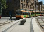 Zweisystem-Doppelzug, vorn 865, des Karlsruher Verkehrsverbundes am 09.05.2002 in Heibronn Bahnhofs-Vorplatz auf der Fahrt als S4 ber Eppingen - Karlsruhe nach Baden-Baden.