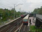 S-Bahn (BR 481) nach Erkner und BR 115 nach Kiew am 7.5.2010 in Berlin Karlshorst.