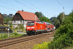 Hier zusehen ist 146 226 mit einer S1 nach Schöna am 30.7.24 in der bekannten Fotokurve bei Rathen im Elbtal.