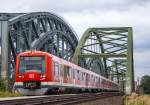 Zwei Triebzüge der Baureihe 474 als S31 nach Neugraben auf der Norderelbbrücke in Hamburg-Veddel (30.08.2012)