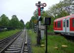 Ausfahrt eines Zuges der Hamburger S-Bahn aus der Station  Slldorf .