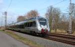 1442 212 und 1442 213 fahren am 15.03.2014 mit der S5X nach Zwickau (Sachs) Hbf aus der Ortslage von Gößnitz heraus.