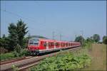 S-Bahnzug der Linie S8, (S5 Dortmund Hbf - Hagen Hbf), von Mnchengladbach Hbf nach Dortmund Hbf, ist bei Harkortsee auf dem Weg zum Zielbahnhof.