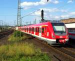 422 052/552 als hintere Einheit der S7, verlsst zusammen mit 422 011/511(vorn) den Dsseldorfer Hbf in Richtung Flughafen-Terminal am 28.07.09