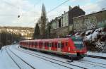 422 036-4 als S9 nach Bottrop Hbf unmittelbar vor dem Halt in Wuppertal - Zoologischer Garten.