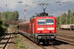 143 870-4 hinter der S6 nach Essen Hbf. bei der Ausfahrt aus Dsseldorf-Rath 16.9.2013