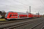 445 010-5 erreicht am 24.11.2017 als S3 von Güstrow nach Warnemünde den Rostocker Hauptbahnhof.