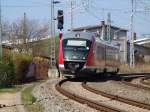 Die S-Bahn der Linie3 von Rostock Hbf.nach Rostock-Seehafen Nord kurz nach der Ausfahrt aus dem Rostocker Hbf.Aufgenommen am 23.04.05