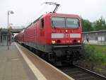 143 841-5 mit S1 von Rostock Hbf Richtung Warnemnde bei der Ausfahrt im Hp Rostock-Ltten Klein.(18.06.10) 