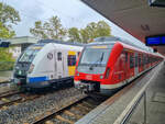 Neuer und alter Lack der S-Bahn Stuttgart: ET 430 244 mit der S3 nach Flughafen/Messe neben ET 430 053 in Bad Cannstatt, 02.10.2022.