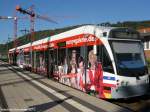 Saarbahn mit neuer Werbung fr die Europa Gallerie, die am 21.10.2010 in Saarbrcken am Hauptbahnhof erffnet.