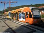 Saarbahn mit Werbung auf dem Bahnhof in Saarbrcken Brebach.