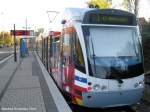 Saarbahn mit Werbung fr die Europa Gallerie an der Haltestelle Saarbrcken Siedlerheim.