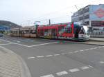 Das Foto zeigt die Saarbahn mit Werbung fr den Media Markt am Rmerkastell in Saarbrcken.