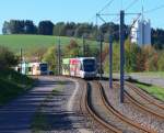 Im bunten Farbkleid.......sind die Saarbahntriebwagen 1003 und 1014 am Russenweg in Walpershofen unterwegs.