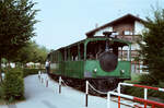 Dampfzug der Chiemseebahn mit einem mutigen Schaffner (20.08.1983)