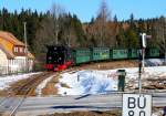99 785 der Fichtelbergbahn luft am 26.02.2011 mit ihrem Planzug aus Oberwiesenthal im Bf.