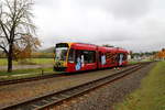 Auf der Fahrt des IG HSB-Sonderzuges von Nordhausen nach Quedlinburg gab es am 22.10.2016 in Nordhausen Krimderode eine Kreuzung mit einem Hybridzug (Siemens Combino Duo) der Nordhäuser Straßenbahn, welcher hier gerade in den Haltepunkt einfährt.