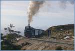 99 5902 mit einem Sonderzug fr englische Eisenbahnenthusiasten erreicht in Krze die Endstation auf dem Brocken.