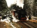 99 7237-3 der Harzer Schmalspurbahnen mit Zug 8945 Drei Annen-Brocken bei Goetheweg am 16-10-1997.