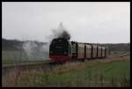 Molli 992322 erreicht hier am 19.11.2015 mit ihrem Zug auf dem Weg nach Kühlungsborn den Haltepunkt Steilküste!