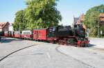 Schmalspurbahn Molli fhrt mit der 99 323 durch Bad Doberan. 24.06.2009