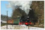 99 4511 fhrt am 09.02.2003 mit ihrem Zug in Seifersdorf nach Dippoldiswalde aus.