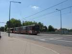 Zwei unbekannte Stadtbahnwagen aus der Serie K5100 unterwegs als Linie 4 Fahrtrichtung Schlebusch auf der Brcke ber die A3 sdlich der Haltestelle  Im Weidenbruch .