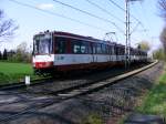 Eine Doppeltraktion aus Stadtbahnwagen B der Rheinbahn vor der Haltestelle in Dsseldorf-Froschenteich als Zug der Linie U79 nach Dsseldorf Hbf am 17.