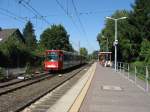 Am 16.8.13 konnte TW 2211 unterwegs als Linie 18 Richtung Brhl an der Haltestelle  Brhl Nord  fotografiert werden.