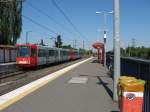 Am 16.8.13 machte TW 2203, mit einem weiteren unbekannten Fahrzeug der gleichen Serie, unterwegs als Linie 18 Richtung Brhl in Brhl-Vochem station.