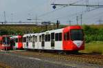 Der modernisierte B-Wagen 2428 gekuppelt mit 2426 auf Testfahrt in Weiden am 02.06.2014.