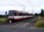 Eine Doppeltraktion aus Stadtbahnwagen B der Rheinbahn vor der Haltestelle Krefeld-Grundend als Linie U76 nach Krefeld-Rheinstrae am 07.