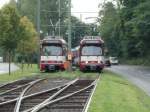 Zwei Doppeltraktionen aus DUEWAG-Stadtbahnwagen GT8SU der Rheinbahn in der Abstellanlage am westlichen Ende der Stadtbahnlinie U75 am Neusser Hbf - 30.09.2004.