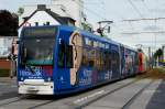 Niederflurwagen 4046 mit Ganzreklame fr  Kttgen Hrakustik  auf der Kreuzung Aachener Strae / Frechener Weg am 09.05.2012