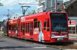 Niederflurwagen 4029 mit neuer Ganzreklame fr das Mbelhaus  Hffner  an der Haltestelle Weiden Schulstrae am 07.06.2012