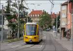 Stadler Tango in Stuttgart -     Optisch wieder mehr Straßenbahn durch die abgerundete Front, die sich auch etwas verjüngt.