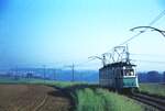 END Straßenbahn Esslingen-Nellingen-Denkendorf__Tw 10 fährt nach der Haltestelle 'Hagenäcker' talwärts nach Scharnhausen.__09-06-1976