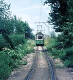 Straßenbahn Reutlingen__Tw 51 [ME 1928] auf Linie 3 am Ortsrand von Rommelsbach.__Mai 1970